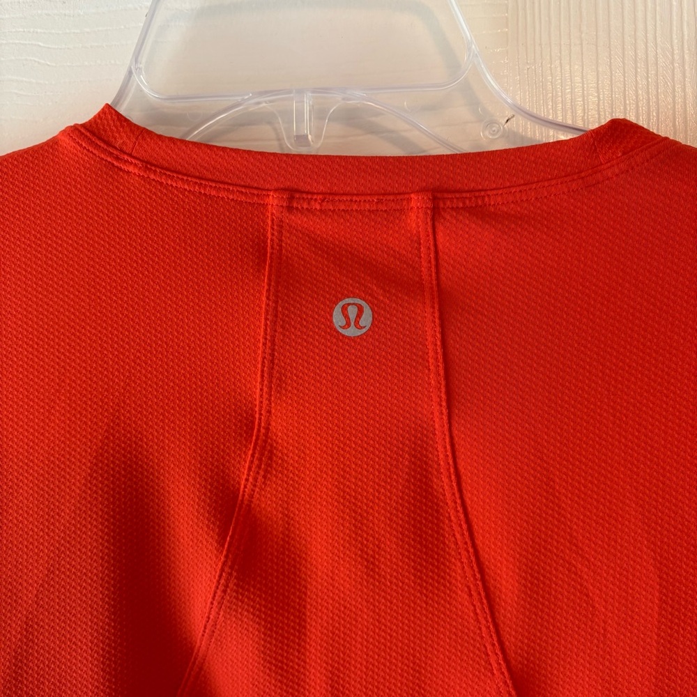Lululemon Muscle Love Orange Long Sleeve Crop Top